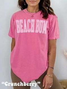 The ultimate Beach Shirt, get ready for Summer or Beachy Vacation with this cute Beach Bum Shirt! This Preppy Comfort Colors® Tshirt is super comfy! Size up for a Trendy Oversized Look! ♥ Hello and Welcome to Meaningful Tees Shop! ♥ Models are wearing Crunchberry, Chambray, Chalky Mint, Lagoon Blue, Island Reef, Washed Denim ♥ All of our items are made one at a time with care for each customer : ) ♥ Please allow 3-7 BUSINESS days (usually 3-5) for your item to be created PLUS shipping time via USPS ♥ UNISEX TEES fit like a Mens Shirt on Women, but are not overly large. ♥ For a RELAXED FIT, your usual size will typically work, but please consult the Size Chart in the Listing Photos ♥ For a TRENDY OVERSIZED FIT, size up 1, 2, or 3 Sizes! (2 sizes up is most common) ♥ For a SNUG FIT, size dow Pink Summer T-shirt For Vacation, Pink Summer Vacation Top, Trendy Cotton Tops For Vacation, Pink Summer Vacation Tops, Pink Summer Top For Vacation, Pink Summer Tops For Vacation, Cute Beach Tops For Vacation, Fun Cotton Tops For Beach, Fun Cotton Top For The Beach