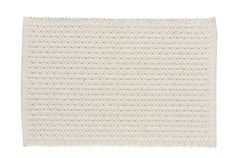 a white knitted placemat on a white background