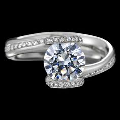 a white gold ring with diamonds on it