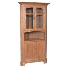 a wooden cabinet with glass doors on the front and bottom shelves, in light wood