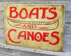 a sign that says boats and canoes on it