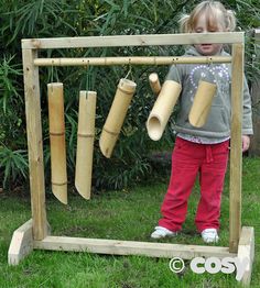 A self standing frame of bamboo chimes. These make a lovely clonking sound when    struck. Will make a nice sound on windy days too. Beater not included. Use for other    instruments too.    Frame H 90cm x W 84cm. 5 bamboo chimes. Self-assembly. Bamboo Chimes, Music Frame, Outdoor Learning Spaces, Farm Craft, Backyard Kids Play Area, Bamboo Wind Chimes, Diy Playground, Toddler School, Outdoor Music