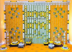 a decorated stage with yellow and white decorations