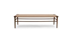 a wooden bench with woven seat cushions on it's back legs, against a white background