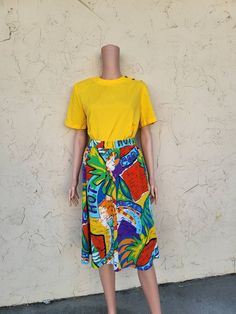 Vintage Lucia lemon yellow short sleeve top. Silver tone buttons on the shoulder. Removable shoulder pads. 100% polyester. Made in the USA.  Measurements are approximate and in inches while laying flat: Length-24, Pit to Pit-19, Sleeve-8.5 Womens Blouses, Yellow Short, Knoxville Tn, Yellow Shorts, Lemon Yellow, Vintage Yellow, Short Sleeve Blouse, Short Sleeve Top, Shoulder Pads