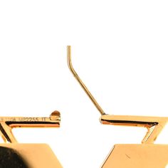 This is an authentic LOUIS VUITTON V Single Hoop Earring in Gold. This charming earring features a prominent signature Louis Vuitton V in gold with a dangling chain charm detail. Earring Gold, Drop Earring, Gold Drop Earrings, Authentic Louis Vuitton, Gold Earrings, Hoop Earrings, Louis Vuitton, Drop Earrings, Chain