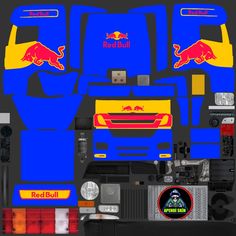 the red bull logo is on the side of a blue truck with other parts around it