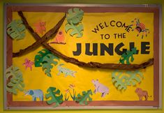 a welcome to the jungle bulletin board with paper cut outs and rope on it's sides