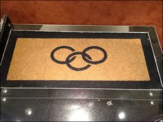 a door mat with two rings on it