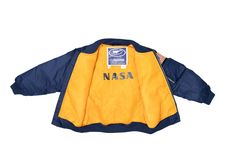 Style Name: Adult NASA JacketColor: Navy Description: Two embroidered patches: NASA, American Flag.Silk-screened NASA logo on lining. Fabric and Care: 100% NylonWater-resistantMachine Washable Sizes: S-XXXL Nasa Jacket, Nasa Logo, Logo Line, Lining Fabric, Embroidered Patches, Nasa, American Flag, Flag, Silk