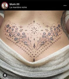 a woman's stomach with an intricate design on the bottom and back side piece