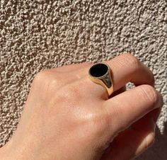 Product details: ♥ 14K Gold or 10k Gold ✦ Solid 14k gold or 10k gold (available in white, yellow, or rose) ✦ Stone: Black Onyx - 14mm * 12mm ✦ Band thickness: 9mm ~ 1.8mm ✦ Custom handmade to order. ✦ This listing is for one ring. ✦ Free Ring Gift Box Included ✦ If you need any questions please leave me a message I am always happy to help you! * Ready to Ship in 2 Weeks ✦ All of our jewelry is handmade in our studio in the U.S. - Handmade in New York with Love ♥ ♥ ♥ ♥ ♥ ♥ ♥ ♥ ♥ ♥ ♥ ♥ ♥ ♥ ENTER O Luxury Onyx Round Signet Ring, Yellow Gold Signet Ring With Black Enamel, Onyx Signet Ring Gift, Onyx Signet Ring For Gift, Yellow Gold Onyx Signet Ring With Black Enamel, Onyx Signet Ring With Black Enamel For Anniversary, Black 14k Gold Heirloom Signet Ring, Black 14k Stamped Signet Ring As Gift, Black 14k Stamped Signet Ring For Gift