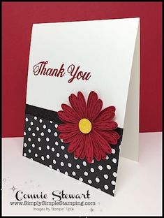 a thank you card with a red flower and polka dot design on it, in front of a red background