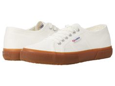 Superga 2750 COTU Classic Sneaker - Women's Lace up casual Shoes : White/Dark Gum : The Superga 2750 COTU Classic Sneaker is the casual shoe of your dreams. Lace-up sneaker boasts a sturdy unlined cotton canvas upper. Cushioned footbed provides sustained comfort for all-day wear. Natural rubber outsole offers traction and durability. Machine wash, air dry. Imported. Measurements: Weight: 14 oz Product measurements were taken using size 40 (US Women's 9), width Medium. Please note that measuremen Cotton Sneakers With Textured Sole And Round Toe, Cotton Sneakers With Textured Sole, Cotton Sneakers With Cushioned Footbed And White Sole, Sporty Cotton Canvas Shoes With Textured Sole, Casual Cotton Sneakers With Rubber Waffle Outsoles, Everyday Cotton Sneakers With Textured Sole, Casual Everyday Sneakers With Waffle Outsoles, Casual White Canvas Shoes With Gum Sole, Casual Cotton Canvas Shoes With Contrast Sole