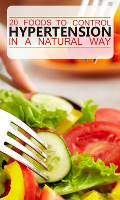 a salad with tomatoes, cucumbers and lettuce on it is being held by a fork