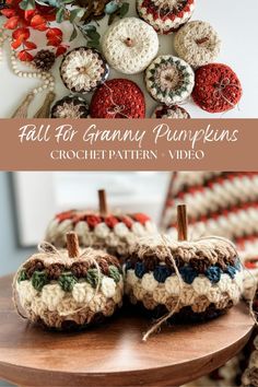 some crocheted pumpkins sitting on top of a wooden table with text overlay that says fall for granny pumpkins crochetpatter video