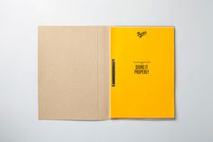 an open notebook with the words don't trust property written on it