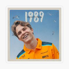 a man in an orange shirt with seagulls behind him and the words 991 on it