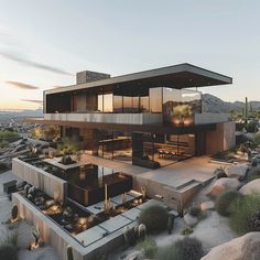 an aerial view of a modern house in the desert