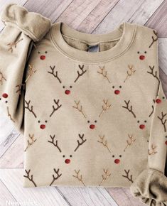 a sweater with reindeer antlers on it