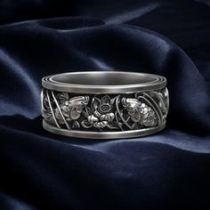 Embrace the timeless beauty of Japanese culture with this Carp Koi Fish Traditional Pattern Ring, expertly crafted from 925 sterling silver. The koi fish, a symbol of perseverance, strength, and good fortune in Japanese tradition, is intricately detailed in this unique design, capturing the fluid grace of the fish swimming through water. Designed for both men and women, this nature-inspired ring adds a touch of cultural elegance to any outfit, making it a perfect statement piece for those who ap Carved Silver Fine Jewelry, Viking Ring, Masonic Ring, Retro Ring, Traditional Pattern, Fish Swimming, Pattern Ring, Animal Rings, Everyday Rings