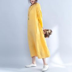 Item Code: 632829509654 Item Type: women dressMaterial: linen,cottonSeason: spring,summer,autumnStyle: casualCollar type: round neckClothing placket: pulloverPattern: plainSleeve: long sleeveClothing details: button,pocket,pleatedWaist: looseCombination: single pieceColor: yellow One Size Fit M/L(Fit for EU 38-44,US8-14,UK12-18,AU12-18,NZ12-18)Length: 117.00 cm/ 46.06 "Bust: 118.00 cm/ 46.46 "Shoulder: 59.00 cm/ 23.23 "Sleeve length: 35.00 cm/ 13.78 "Cuff: 29.00 cm/ 11.42 "Hem: looseWaist: 128.00 cm/ 50.39 " The model height:168cm,weight:45kg,bust:81cm,waist:61cm,hips:93cmusually wear US Middle sizePS:1.The measurement is measured by hands,there will be 1 cm-3 cm in error,hope you can understand.2.The product is taken in the bright light,there may be a little different in the color of the Cotton Maxi Dress For Fall Beach, Cotton Maxi Dress For Fall Beach Outings, Cotton Maxi Dress For Beach In Fall, Summer Linen Long Sleeve Dress, Spring Linen Dress With Relaxed Fit, Long Sleeve Linen Dress For Summer, Summer Long Sleeve Solid Linen Dress, Relaxed Fit Solid Color Linen Dress For Spring, Casual Crew Neck Maxi Dress For Spring