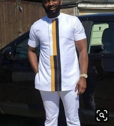 This listing features an Authentic African Shirt made from 100% pure quality fabric with exceptionally accurate neat and durable stitching. This is Ideal for all your formal occasions. You will look natively executive anytime you put on this wear. night. 》Make ●Men's African Shirt ●Versatile and suitable for all occasions and personalities ●Made with your comfort in mind 》Color ●White 》Features ●Round Neckline ●Short Sleeve Length ●Long Tight Fitting ●Executive Finishing ●Regular Fit Suit ●100% African Male Suits, Dashiki For Men, Matching Pants Set, African Suit, Nigerian Men Fashion, Dashiki Shirt, African Attire For Men, African Dresses Men, African Shirts For Men