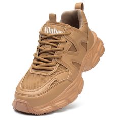 a tan sneaker is shown with the word's logo on the upper part