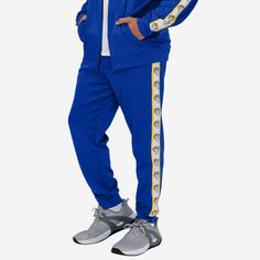 Los Angeles Rams Stripe Logo Track Pants FOCO S - FOCO.com Casual Sports Team-colored Bottoms, Team-colored Casual Bottoms For Sports Events, Casual Team-colored Bottoms For Sports Events, Casual Stretch Bottoms For Sports Events, Stretch Cotton Bottoms For Sports Events, Casual Moisture-wicking Joggers For Sports Events, La Rams, Logo Display, Jogging Suit