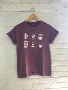 "Hand Printed and Hand Drawn! This is a 100% cotton screen printed graphic t shirt with various ways to brew coffee. This coffee tshirt listing is for a Comfort Colors 100% ringspun cotton, preshrunk, garment dyed tee. This is a thick but soft tee. The color is called berry. // PROCESS: All of our items are individually hand printed by either me or my dad, which can lead to slight variations in placement. The ink is heat cured and will not fade over time. Since our items are printed to order, th Coffee Color Crew Neck T-shirt For Everyday, Coffee Color Short Sleeve T-shirt With Screen Print, Pre-shrunk Cotton Coffee Colored Tops, Pre-shrunk Cotton Coffee Tops, Coffee Crew Neck Top With Screen Print, Coffee Colored Cotton Graphic Tee, Coffee-colored Crew Neck Top With Screen Print, Coffee Cotton Graphic Tee, Coffee Cotton T-shirt With Screen Print