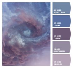 the sky is filled with purple clouds and blue hues, as well as an image of