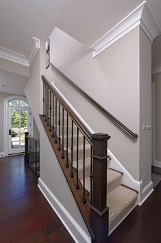 the stairs in this house are made of wood and metal