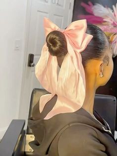 A high ponytail with a large bow is a cute and easy hairstyle that works wonderfully for picture day. It’s simple to achieve and provides a neat, polished look that stays in place. To create this hairstyle, gather the hair into a high ponytail at the crown of the head and secure it with a hair tie. Smooth out any flyaways with a bit of hairspray or gel for a sleek finish. To add a fun touch, tie a large, colorful bow around the ponytail. This look is perfect for kids with long or medium-length hair and can be easily done in just a few minutes, making it a go-to option for busy picture day mornings.