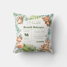 the birth announcement pillow is shown with an owl and fox design on it's front