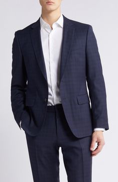 Patterned in a pale plaid, this suit tailored from heathered wool features classic detailing and softer construction for comfort during formal occasions. Jacket has notched lapels; four-button cuffs; chest pocket; welt pockets; side vents Trousers have zip fly with button-tab closure; slant pockets; back button-welt pockets Jacket is partially lined 100% virgin wool Spot clean Made in Turkey Plaid Wool Suits For Formal Occasions, Elegant Plaid Business Suit, Semi-formal Plaid Suit With Notch Lapel, Classic Plaid Suits For Formal Occasions, Tailored Plaid Suits With Welt Pockets, Formal Plaid Suits With Notch Lapel, Classic Tailored Plaid Three-piece Suit, Plaid Notch Lapel Suit For Formal Occasions, Timeless Plaid Suits For Formal Occasions