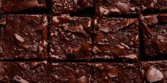 chocolate brownies cut into squares on top of each other