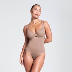 Talk about results! This lightweight brief uses targeted zones to tone your tummy and give you a perky rear view. The high waist offers added tummy control and eliminates muffin top without digging in, while the seamless design provides all-day comfort and support that won't show through (bye, visible panty lines!). High Waist Supportive Shapewear, Bra Friendly, Supportive Brief Shapewear With Built-in Bra, High Waist Bra Friendly Shapewear, Sculpting Shapewear Brief With Built-in Bra, Sculpting Shapewear With Built-in Bra In Brief Style, High Waist Bra-friendly Shapewear, Sculpting Push-up Bra-friendly Shapewear, Rear View, Briefs