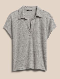 Breezy and sophisticated, this soft top is crafted from linen, a luxurious fabric beloved for its lightweight feel and incredible drape.  A perfect polo for warmer seasons.  RELAXED FIT: Expertly cut for a loose fit.  Polo collar with clean placket. Linen Polo Shirt, Soft Tops, Polo Collar, Luxury Fabrics, Heather Gray, Heather Grey, Banana Republic, Men's Polo Shirt, Polo Ralph Lauren