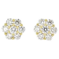 Introducing our exquisite 18kt Yellow Gold ethically sourced natural diamond cluster stud earrings. These earrings offer a timeless and classic look that effortlessly transitions from daytime to nighttime, ensuring elegance at every moment. Crafted with 18kt Yellow gold, these earrings exhibit a luxurious and radiant shine that beautifully complements the natural brilliance of diamonds. The white gold setting serves as a perfect backdrop, enhancing the sparkle and fire of the ethically sourced diamonds. The understated sophistication of the classic stud design makes them perfect for adding a touch of sparkle to your professional attire or casual ensembles. As the sun sets and the evening unfolds, these earrings seamlessly transition into a glamorous accessory that complements your elegant Luxury Yellow Gold Cluster Earrings Vvs Clarity, Luxury 14k Gold Cluster Earrings With Brilliant Cut, Belgian Modern, Classic Yellow Gold Flower-shaped Cluster Earrings, Luxury Diamond Flower-shaped Cluster Earrings, Luxury Diamond-cut Cubic Zirconia Cluster Earrings, White Gold Earrings Studs, White Gold Studs, Diamond Cluster Earrings