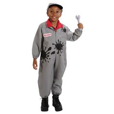 a young boy dressed in a grey and red onesuit with black paint splatters on it