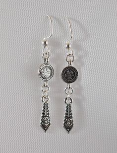 Silver Plated Coin Styled Charms Accented With Dangle Charms On Silver Plated Beaded Earring Hooks Medallion Earrings, Beaded Earring, Earring Hooks, Dangle Charms, Jewelry Earrings Dangle, Silver Plate, Etsy Earrings, Silver Plated, Dangle Drop Earrings