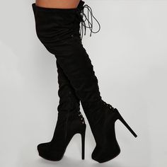 Step up your style with these black platform lace-up thigh-high boots. Featuring a lace-up design, platform sole, and thigh-high length, these boots are perfect for making a bold fashion statement. Color: Black Heel Type: Stiletto heel Heel height: 5.9" / 150 mm approx Product measurements were taken using size 8. Please note that measurements may vary by size. Toe: Almond toe Back hollow-out and lace-up design Handcrafted US sizing. Fits true to size. Black Knee-high Boots With Front Lace-up Fastening, Black Lace-up Boots For Party, Black Lace-up Platform Knee-high Boots, Black Lace-up Knee-high Platform Boots, Fall Lace-up Platform Boots For Night Out, Lace-up Platform Boots For Night Out In Fall, Lace-up Platform Boots For Fall Nights, Knee-high Platform Heeled Boots For Club, Platform Knee-high Heeled Boots For Club