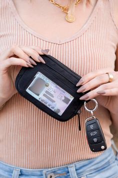 Shop MADISON and MALLORY - Women's Clothing Boutique - Enjoy SAME DAY SHIPPING! Compact and perfectly sized to fit in all your sling bags or to carry solo! Clippable O-ring allows you to attach to keychains, belt loops, bags and beyond! Keep your cards, cash and more within reach. Simply zip, clip and go, whatever journey you're on! Holiday Graphic Tees, Bags Ideas, Id Wallet, Keychain Wallet, Bucket Lists, Sling Bags, Wallet Pouch, Handcrafted Leather, Acrylic Earrings