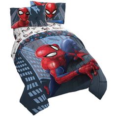 a spiderman bed set with pillows and sheets