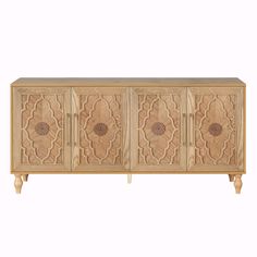 the sideboard is made out of wood and has intricate carvings on the doors, which are