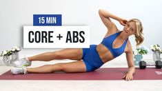 a woman in a blue top and shorts doing a yoga pose on a mat with the words core + abs above her