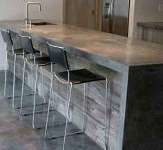 an image of a counter top with four chairs on it and the words black concrete counter tops i home decor pinterest