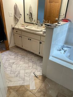 a bathroom that has been remodeled and is in the process of remodeling