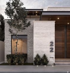 the front entrance to a modern house