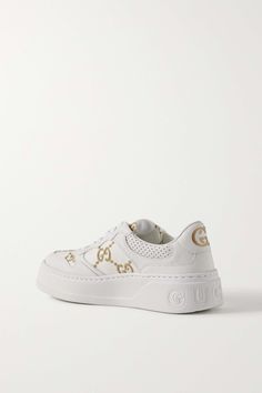 Sporty Gucci Sneakers With Embroidered Logo, Gold Modern Sneakers For Streetwear, Gold Low-top Sneakers With Metallic Logo, Casual Gucci Sneakers With Embossed Logo, Sporty Gucci Sneakers With Embossed Logo, Luxury Custom Sneakers For Streetwear, Gucci Custom Low-top Sneakers With Embroidered Logo, Gucci Custom Sneakers With Embroidered Logo For Streetwear, Custom Gucci Low-top Sneakers With Embroidered Logo